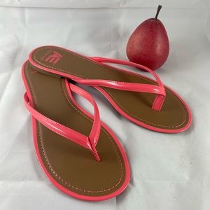 Coral flats, thongs or sandals, size 13. Never worn.